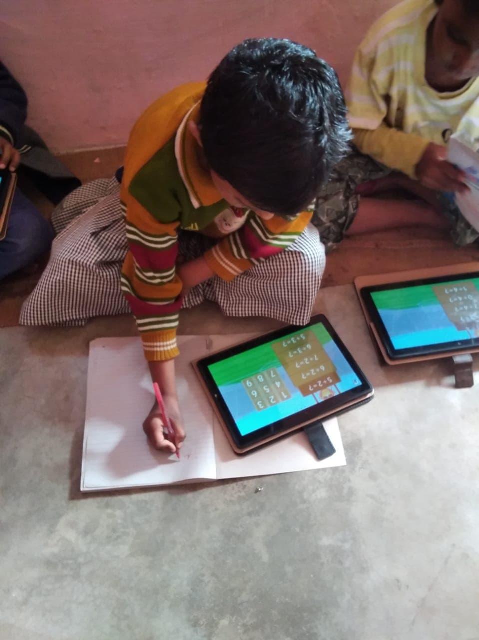 Children learning with women educators